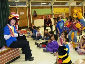 Teacher reading to her classroom